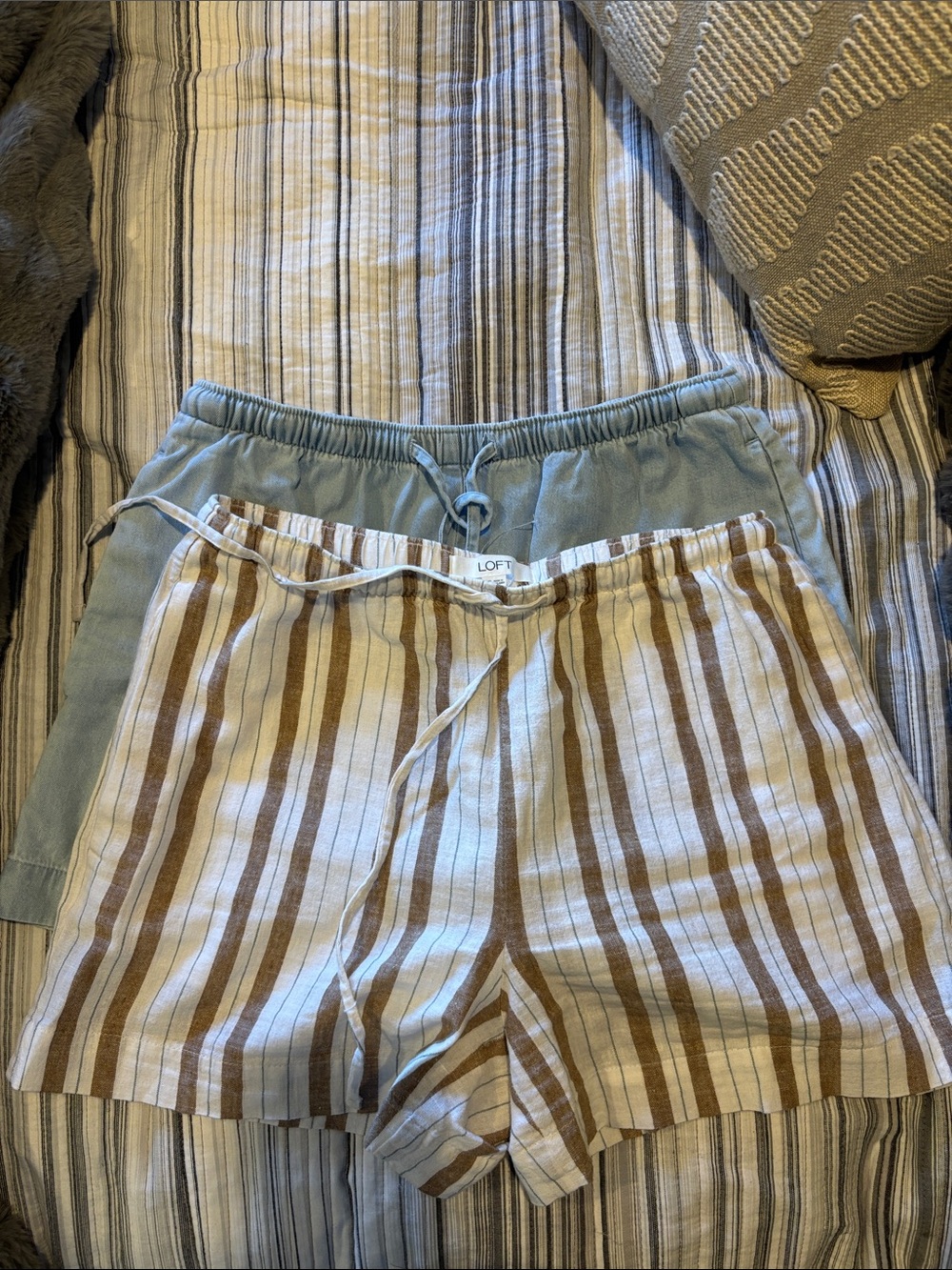 Two pair of LOFT  Light Blue Solid & Brown-Striped Linen Blend Shorts. Like new
